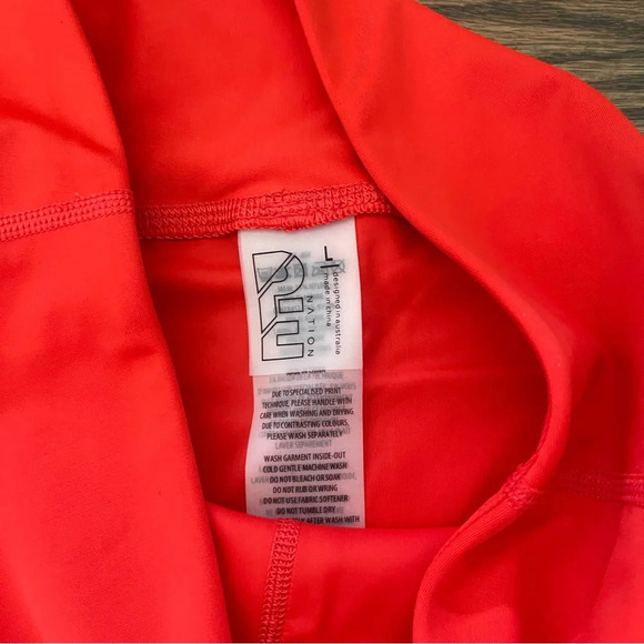 P.E. NATION Red Cutshot Leggings size large - Picture 3 of 7